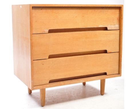 Stag - C Range - A vintage mid 20th century Stag Furniture John and Sylvia Reed C Range teak chest of drawers. The chest rais