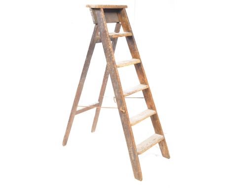 1950s vintage oak folding a-frame step ladder with six rectangular steps. Measures approx: 130x40x80cm