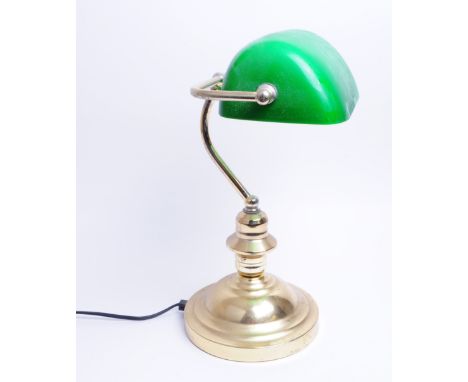 20th century bankers lamp with gilt metal stand with adjustible green and white glass shade atop. Measuring approx. 