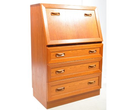 G Plan Furniture - A vintage 20th century teak writing bureau. Rectangular form with pull down front door with appointed inte