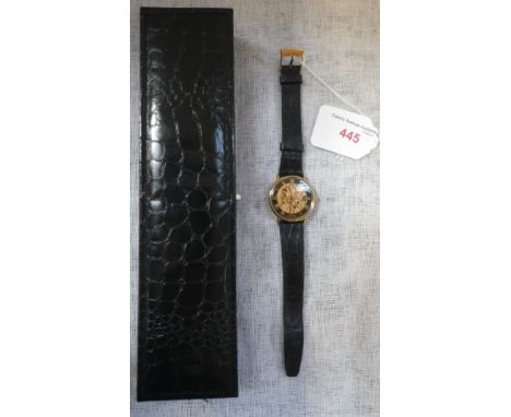 A CHEVALIER GENTLEMAN'S GOLD PLATED SKELETON WRIST WATCH with manual wind movement, Roman numerals and black hands, fitted a 
