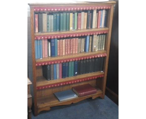 AN EDWARDIAN LIGHT OAK ADJUSTABLE BOOKCASE, 132cm high x 103cm wide