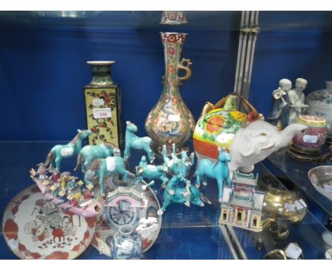 A COLLECTION OF CHINESE GREEN GLAZED HORSES, a Japanese teapot in the form of an elephant and similar ceramics