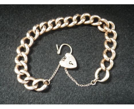 A 9CT YELLOW GOLD BRACELET with padlock clasp, 16gm total weight