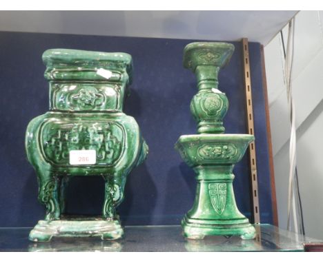 A CHINESE GREEN GLAZED VASE, in the form of a censer, 29cm high and a similar green glazed candle stand, 34cm high (2)