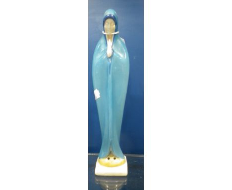 A CONTINENTAL STYLISED CERAMIC STATUE OF A WOMAN PRAYING, 25cm high