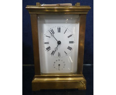 AN EDWARDIAN BRASS CASED CARRIAGE CLOCK with repeater, 14cm high