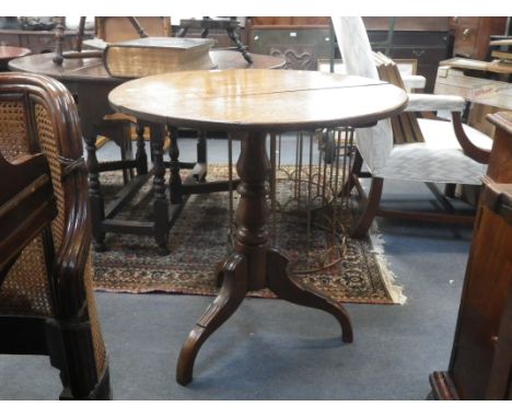 A 19TH CENTURY OAK TRIPOD TABLE, 75cm dia