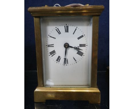 AN EDWARDIAN BRASS CASED CARRIAGE CLOCK, 12cm high