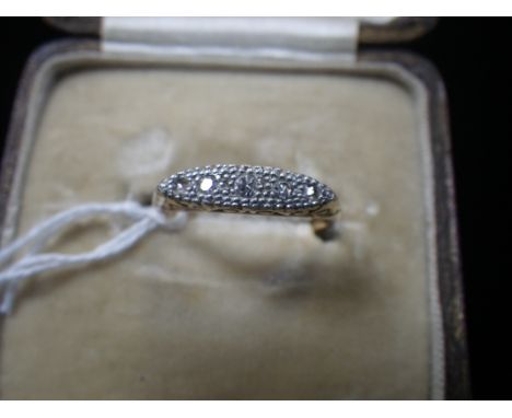 A DIAMOND GYPSY STYLE RING, five diamonds pave set in platinum, on an 18ct yellow gold shank, ring size M