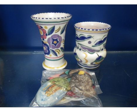 POOLE POTTERY; TWO SMALL TRADITIONAL VASES and a collection of ceramic badges