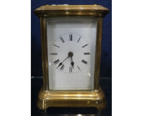 AN EDWARDIAN BRASS CASED CARRIAGE CLOCK, 12cm high