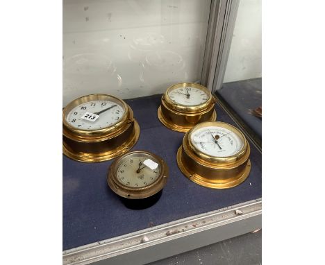 THREE BRASS CASED SHIPS CLOCKS TOGETHER WITH AN ANEROID BAROMETER SIMILARLY CASED