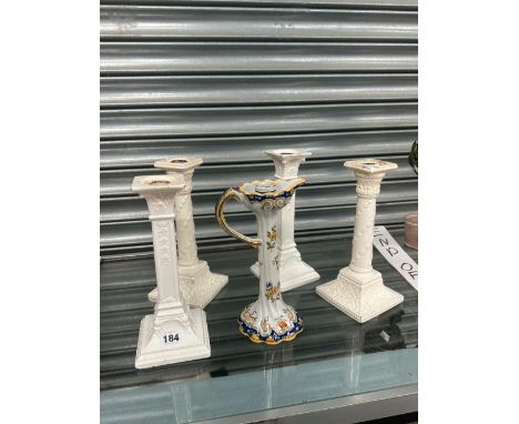 TWO PAIRS OF VIENNA CREAMWARE CANDLESTICKS TOGETHER WITH A QUIMPER CANDLESTICK