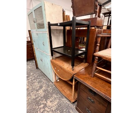 AN ERCOL TYPE ELM DROP LEAF TROLLEY, TOGETHER WITH A PAINTED TROLLEY (2)