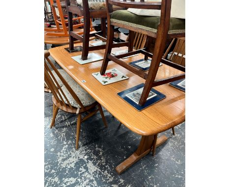 A ERCOL DINING PINE TABLE.   W 152 x D 85 x H 73cms. TOGETHER WITH FOUR ERCOL STICK BACK DINING CHAIRS WITH YOKE SHAPED TOP R