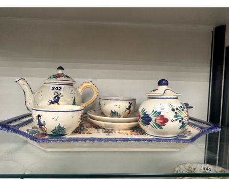 A HENRIOT QUIMPER CABARET SET PAINTED WITH FIGURES AND FLOWERS
