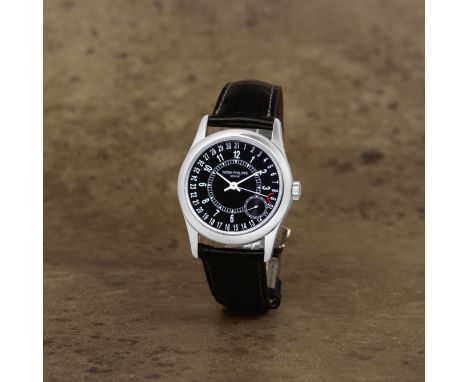 Patek Philippe. An 18K white gold automatic wristwatchModel: CalatravaReference: 6000GDate: Circa 1995Movement: 27-jewel Cal.