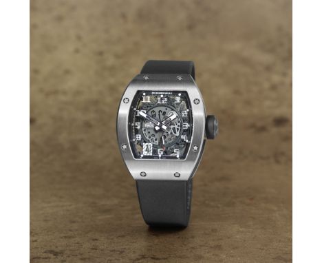 Richard Mille. A fine and rare titanium automatic calendar wristwatchReference: RM010 AH Ti/1144Date: Circa 2010Movement: 32-