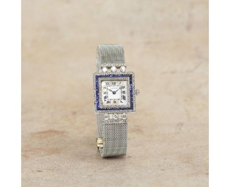 Cartier. A very rare and early platinum, 18K gold, diamond and sapphire set manual wind bracelet watchDate: Circa 1920Movemen