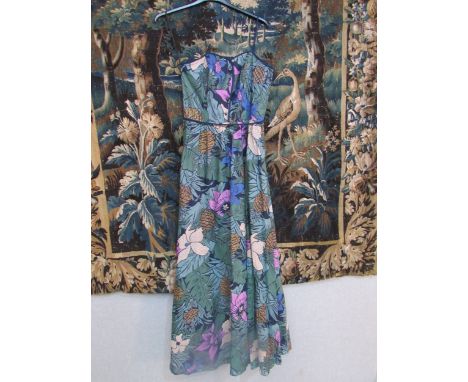 A 1970's "Kerena" model fine cotton full length dress, fully lined, a bold pattern in muted blue/greens and lilac of pineappl