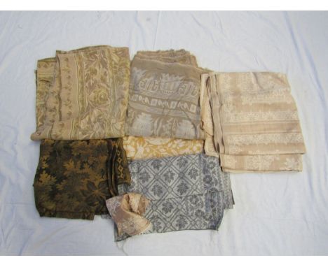 A box containing various textiles including Arts &amp; Crafts table cloth, roll of French linen towelling unused, two 19th Ce