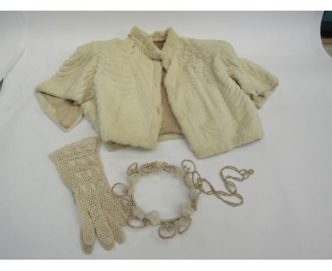A 1930's ermine fur evening cape, ribbed scallop design, a pair of cream lace gloves and a pearl tiara, a/f 