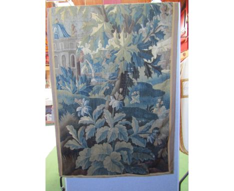 An hand woven wall hanging tapestry featuring a garden/woodland scene with folly and mythical head fountain. 198cm drop x 120