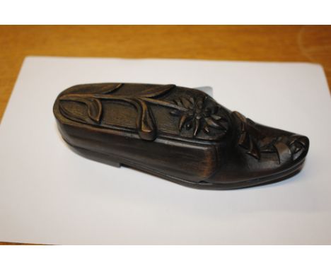 A late 19th Century carved black forest table shoe snuff box 