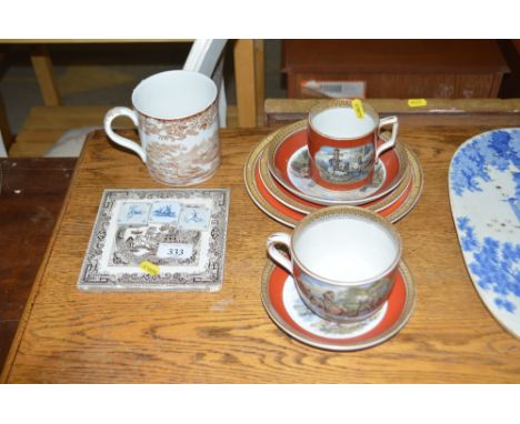 A quantity of Pratt Ware tea cups and saucers; a tile etc
