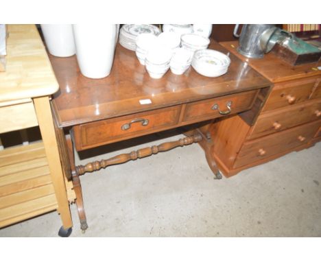 A reproduction walnut sofa table fitted two drawers 