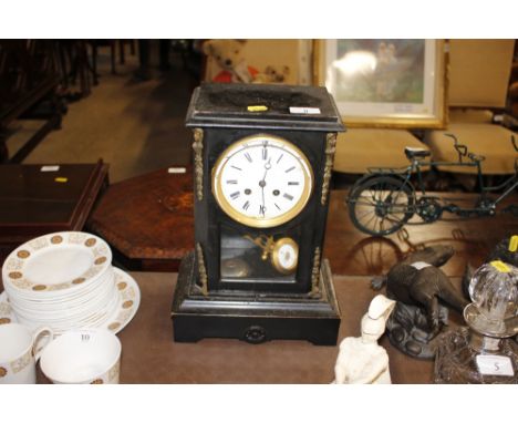 A late 19th Century ebonised bracket clock by Marc of Paris, with adjustable pendulum, eight day movement striking on a bell