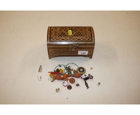 An Eastern inlaid trinket box and contents of costume jewellery