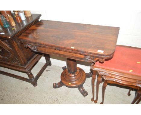 A Victorian rosewood fold over card table 