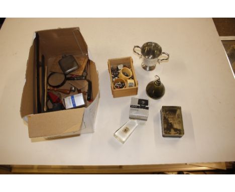 A box containing hip flask; a paperweight; napkin rings; vintage keys etc