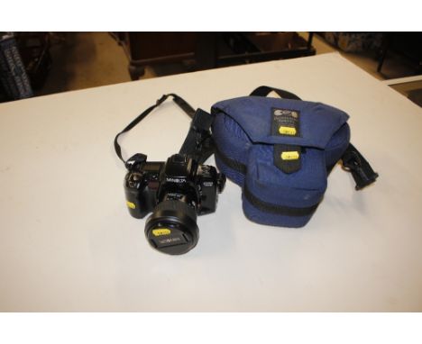 A Minolta camera and carrying case