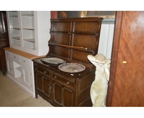A dark Ercol dresser