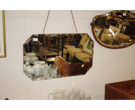 An Art Deco frameless bevel edged wall mirror