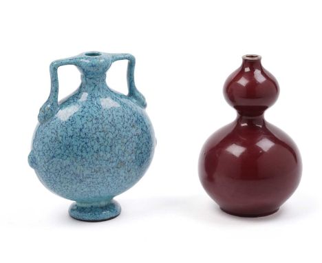 A Chinese 'robin's egg' blue glazed flask with double angular handles, impressed seal mark, 18cms; and an Ox blood glazed dou