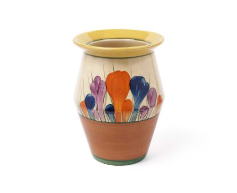 A Clarice Cliff Bizarre ‘Crocus’ Pattern vase, circa 1930s, decorated with stylized crocus flowers in purple, blue, and orang