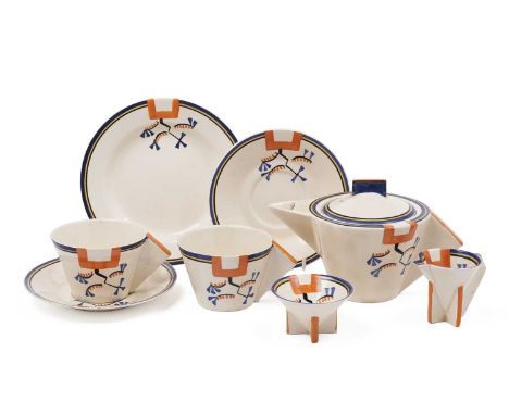 A Clarice Cliff ‘Ravel’ pattern tea service, circa early/mid 1930s, with angular block handles, with blue, yellow, and black 