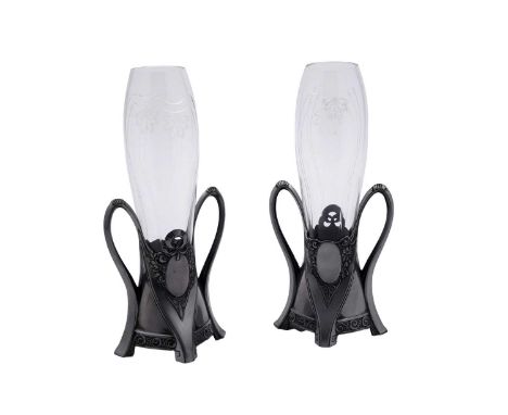 A pair of German Orivit WMF Sollifleur Art Nouveau pewter and glass vases, with high loop handles, the original clear glass l