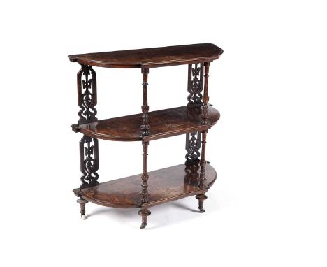 A Victorian burr walnut three-tier bow-fronted whatnot, each tier with boxwood inlay, raised on turned and carved supports, t