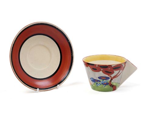 A Clarice Cliff Bizarre Applique ‘Red Tree’ pattern teacup, circa early 1930s, with angular block handle, hand-painted with s