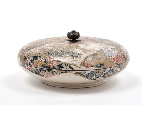 A Japanese Satsuma ware shallow bowl and cover, Meiji period, finely decorated with flowers and leaves on a cellular ground, 