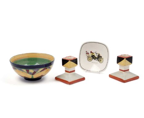 A pair of Bursley Ware dwarf candlesticks, with hand-painted geometric decoration, raised on square bases, 8cms high; togethe