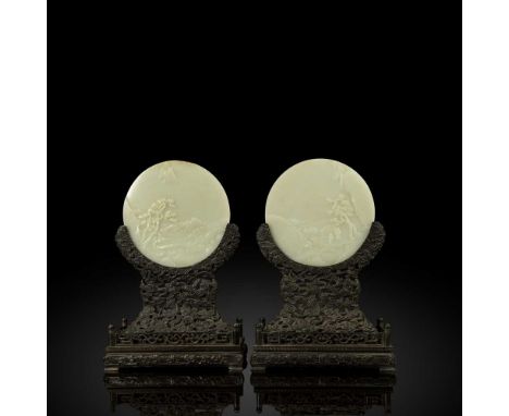 FINELY CARVED AND RARE PAIR OF PALE CELADON JADE TABLE SCREENS WITH ZITAN STANDS QING DYNASTY, QIANLONG PERIOD, 1736-1795 清乾隆