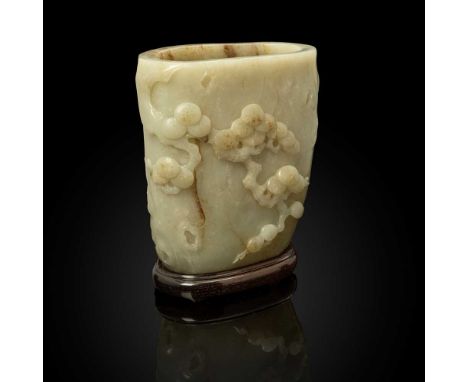 WHITE JADE WITH RUSSET SKIN 'PINE TREE' BRUSH POT QING DYNASTY, 18TH-19TH CENTURY 清 白玉帶皮巧雕松樹瘤紋筆筒 carved from a large white to