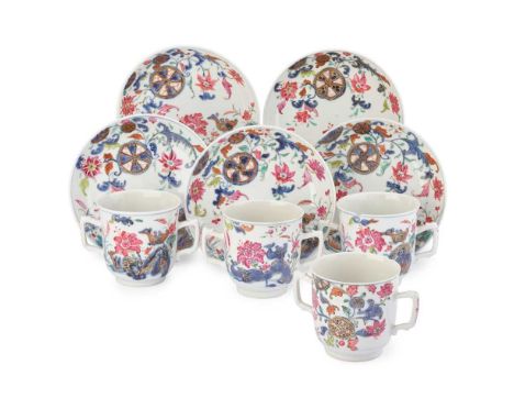 GROUP OF NINE FAMILLE ROSE 'PSEUDO TOBACCO LEAF' WARES QING DYNASTY, QIANLONG PERIOD 清乾隆 粉彩菸葉紋把杯及碟（共九件） comprising: five circ