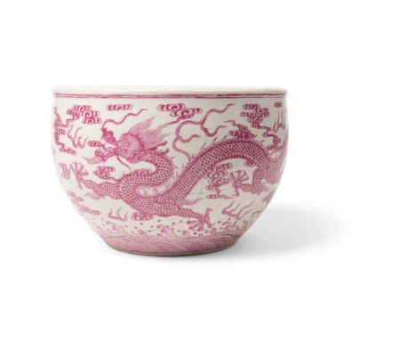 PUCE-ENAMELLED 'DRAGON' BASIN  QING DYNASTY, 18TH-19TH CENTURY  清 胭脂紅彩雙龍紋卷缸 the bulbous body painted on the exterior with two